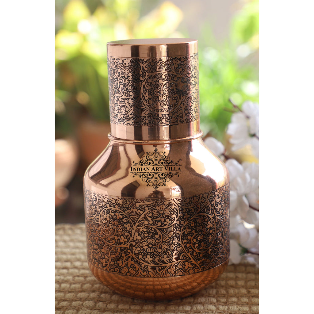 Indian Art Villa Copper Embossed Shine Finish Traditional Ghada Shape bedroom bottle with inbuilt glass, Volume-1500 ML