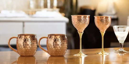 Elegant Copper Barware Display – Indian Art Villa Hammered Mugs & Designer Glasses for Cocktails, Wine & Entertaining.