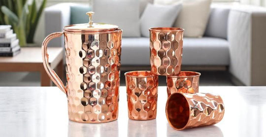 Elegant honeycomb hammered copper jug and glasses set by Indian Art Villa, handcrafted luxury drinkware for modern homes.