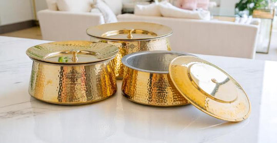 Indian Art Villa hammered brass handi set with lids – traditional Indian cookware for serving and storing food with an elegant golden finish.