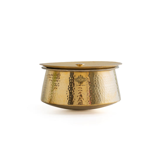 Brass patila handcrafted with hammered golden finish wide round belly fitted lid and smooth silver tin lining inside