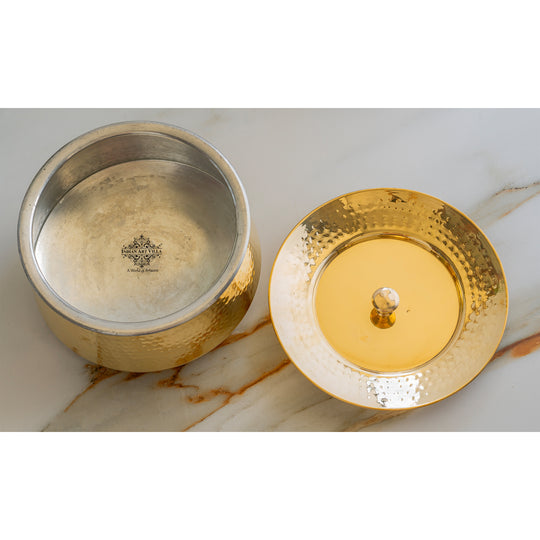 Artistic hammered brass bhagona with polished golden shine and tin lining, complete with a perfectly fitted matching lid