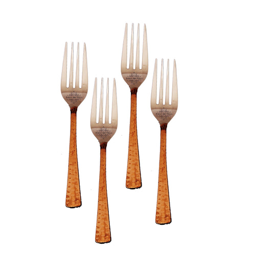 Elegant steel copper table forks with textured hammered handles, perfect for adding sophistication to any dining occasion.