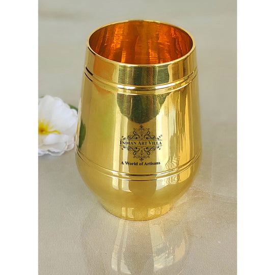 Indian Art Villa handcrafted glossy brass glass with a rich golden hue and inner lining made for traditional hospitality

