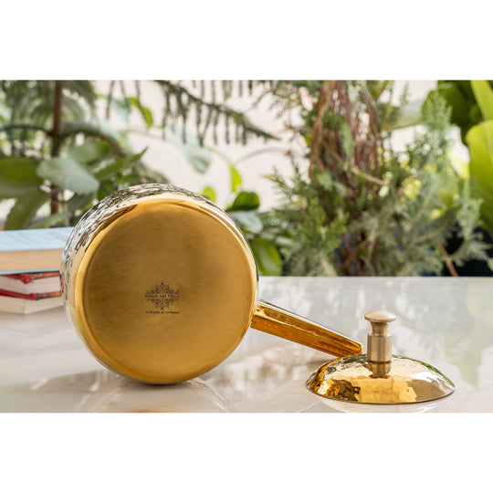 Premium stainless steel cooker with hammered design and PVD gold finish