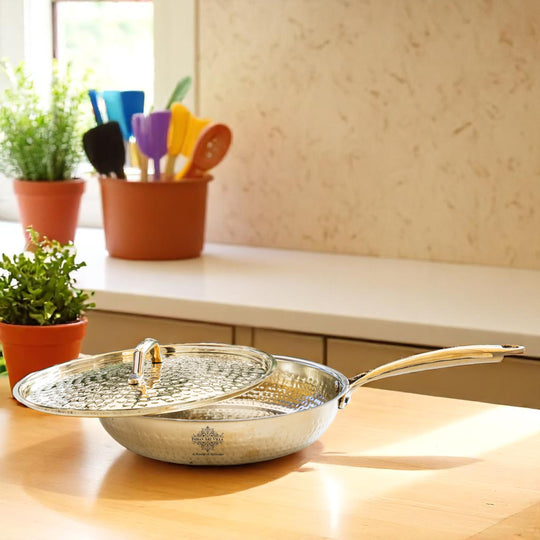 Elegant brass pan with hammered finish lid extended ergonomic handle polished golden body and inner tin lining