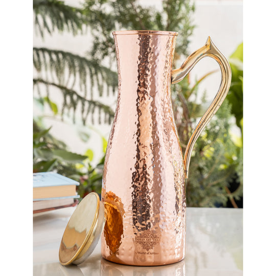 Handcrafted copper jug with hammered design and brass handle, 1400 ML capacity