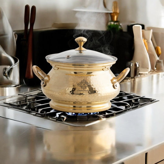 Elegant hammered brass cooking pot by Indian Art Villa with tin lining transparent glass lid and finely detailed brass handles