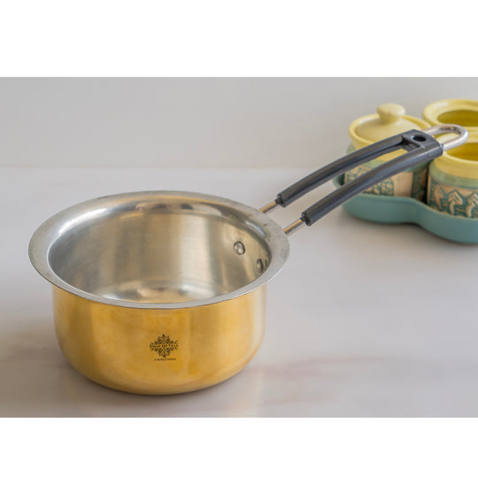 Elegant brass patila with tin lining and long handle durable handmade cookware from Indian Art Villa with shiny surface