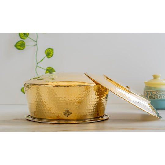 Stunning hammered pital ka patila with lid, polished golden finish and tin interior, full of timeless elegance