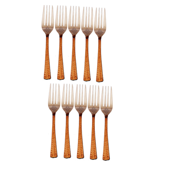 Set of steel copper dining forks with unique hammered design ideal for complementing both classic and modern table settings.