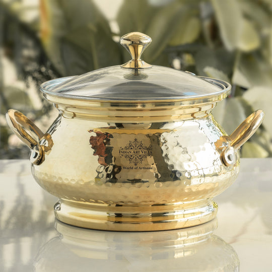 Premium hammered brass cooking pot with glass lid and tin interior made from high-quality brass with fine artisan detailing