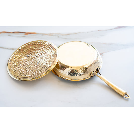 Indian Art Villa handcrafted brass cookware with hammered lid long handle and tin lined interior for safe daily cooking