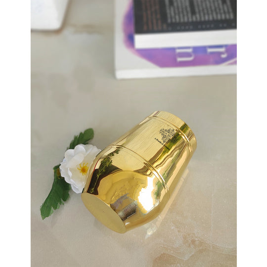 Luxurious shine finish brass glass by Indian Art Villa with sleek form and radiant surface perfect for fine occasions