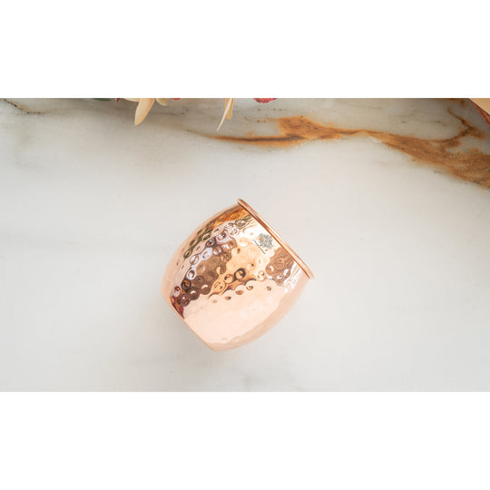 Hammered copper tumbler for wellness routine
