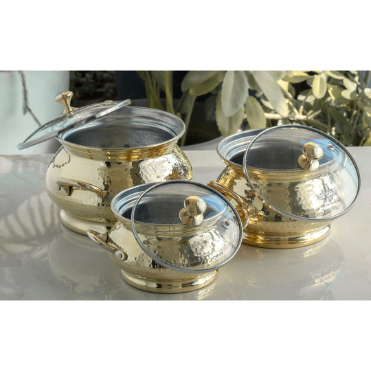 Handcrafted brass pot by Indian Art Villa with polished finish and glass lid ideal for cooking and serving rich flavorful dishes