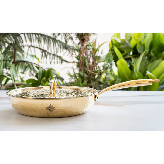 Indian Art Villa premium brass cooking vessel with tin lined interior hammered lid and sturdy handle for easy serving