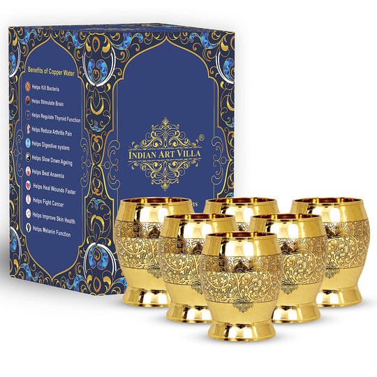 Delicate flower-embossed pure brass tumbler handcrafted to perfection for a timeless touch to your dining.