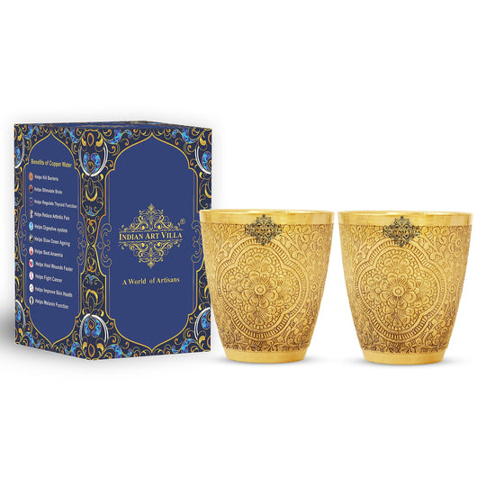 Intricately patterned brass drinking glass perfect for serving refreshing drinks with a traditional charm.