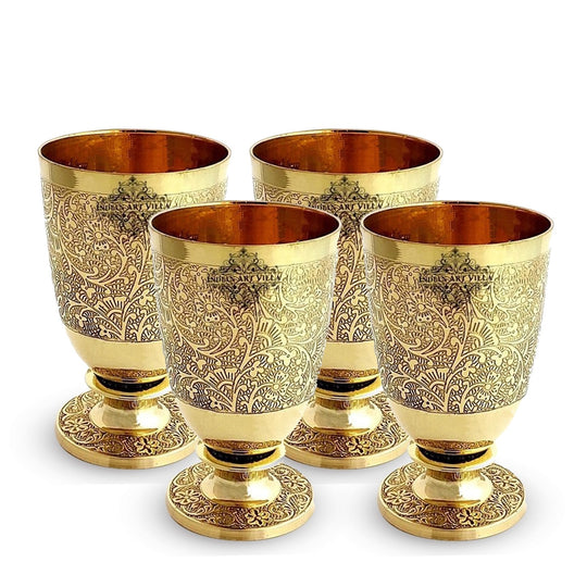 Take Brass tumbler with flower embossed design perfect for home decor adding elegance to tables, mantels, or pooja rooms