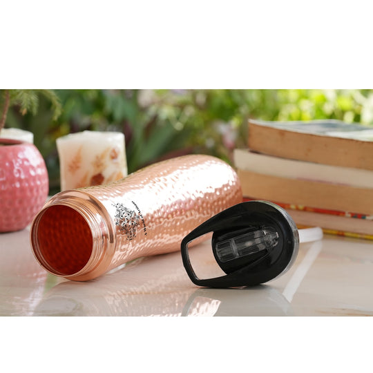 Indian Art Villa pure copper sipper bottle with elegant packaging, designed for Ayurvedic benefits and easy hydration.