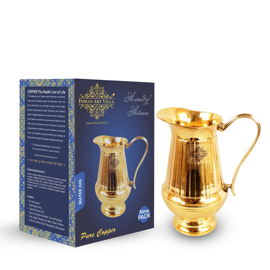 Luxurious brass jug with vertical lined detailing and radiant gold tone crafted for premium table decor and classic serveware