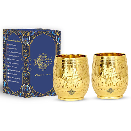 Handmade brass glass featuring intricate leaf engravings a perfect blend of artistry and functionality for your home.