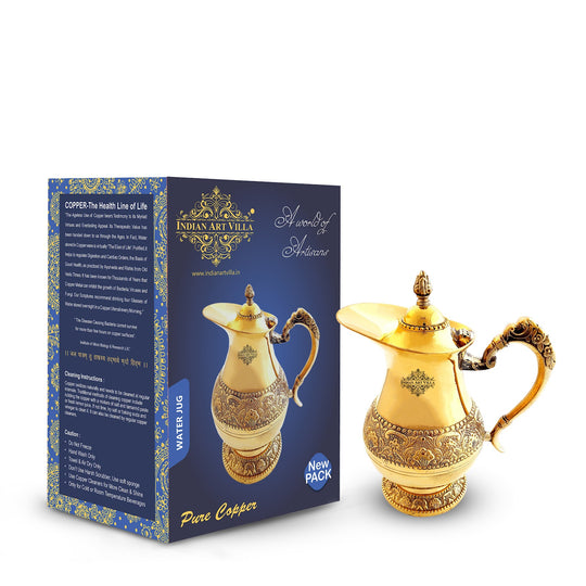 designer embossed mughlai brass jug with intricate patterns and curved antique handle handcrafted by indian art villa