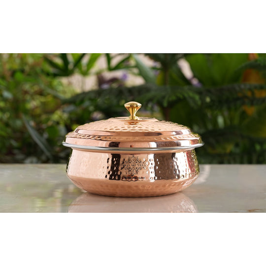 Textured copper handi with shiny brass handle, luxurious centerpiece for Indian dining and elegant celebrations