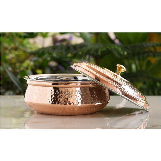 Elegant artisan copper handi with smooth hammered finish, ideal for stylish Indian dining and festive feasts