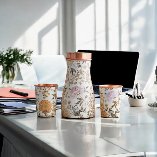 Golden floral design copper bottle and tumbler set by Indian Art Villa, ideal for festive décor and premium gifts.