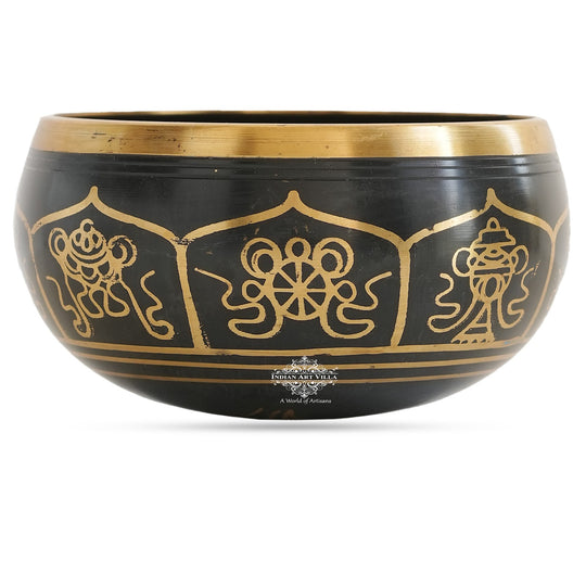 Black brass meditation singing bowl by golden artwork design, sound healing and yoga therapy bowl.