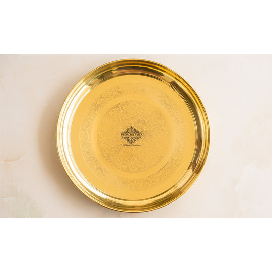 Embossed brass thali with floral carvings elegant round shape and gold tone finish crafted by Indian Art Villa