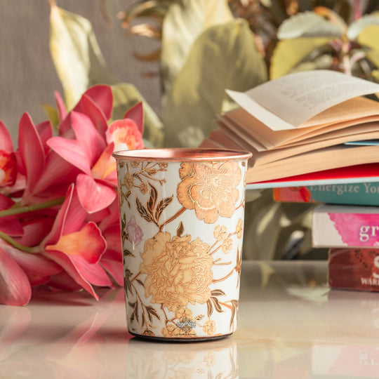 Copper glass with detailed gold floral designs handcrafted by Indian Art Villa for cultural and festive use

