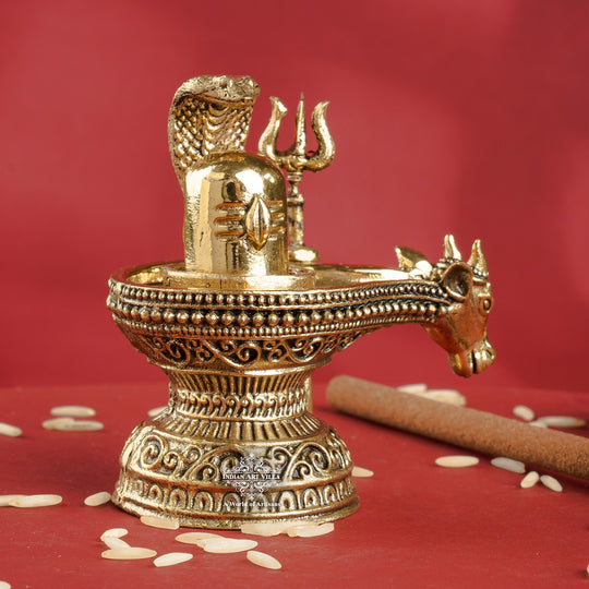 Brass Shivling with Nandi Face & Trishul – Decorative Spiritual Idol