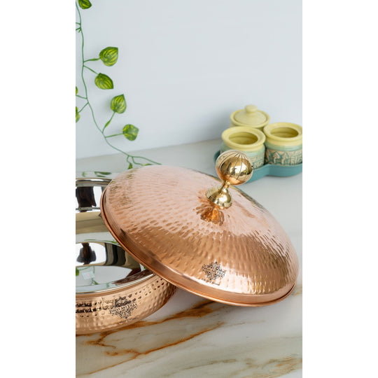 The soul of tradition lives in copper handi 1400ML Indian Art Villa hammered copper lid crowned with luminous brass knob