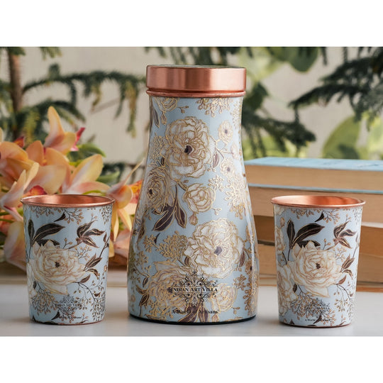 Golden floral design copper bottle and tumbler set by Indian Art Villa, ideal for festive décor and premium gifts.