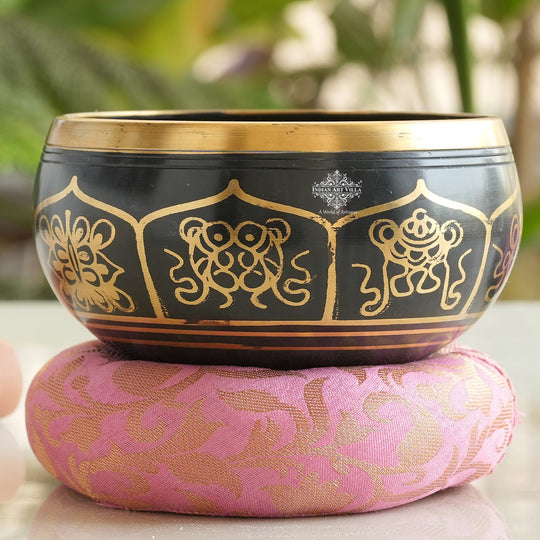 Black brass meditation singing bowl by golden artwork design, sound healing and yoga therapy bowl.