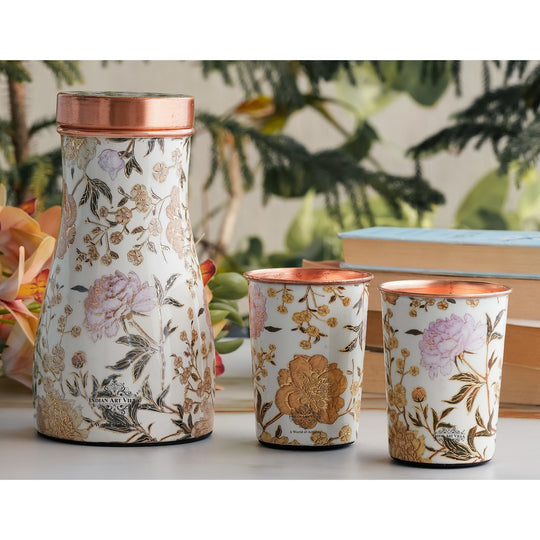 Golden floral design copper bottle and tumbler set by Indian Art Villa, ideal for festive décor and premium gifts.