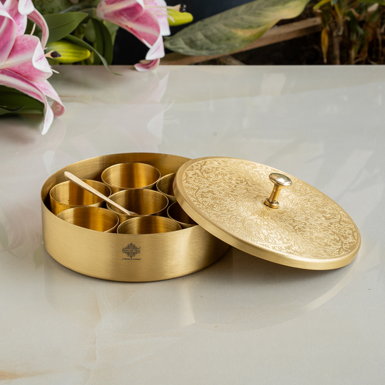 Traditional Indian pure brass masala dabba with engraved lid and 7 compartments for spice storage