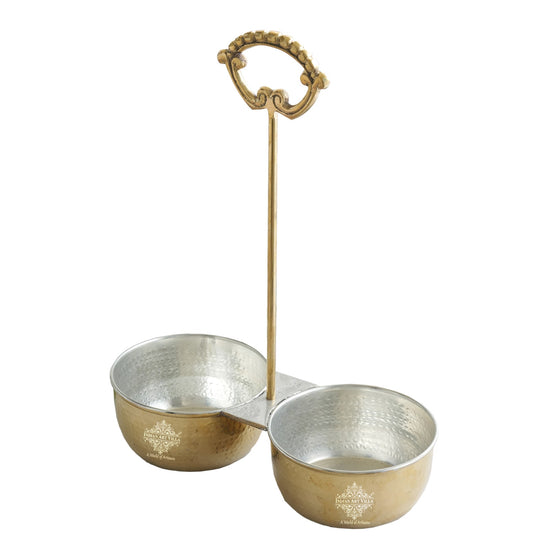 Dual brass vegetable serving bowl with hammered inner surface tin lining and tall decorative handle for balanced serving