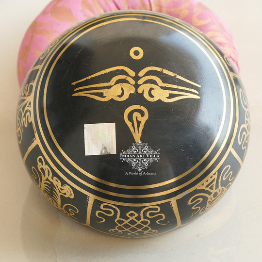 Black brass meditation singing bowl by golden artwork design, sound healing and yoga therapy bowl.