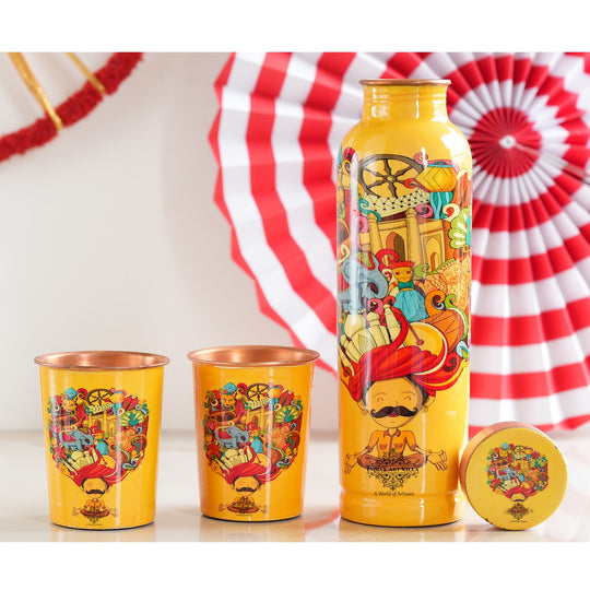 Indian Art Villa's Copper Bottle & Glass Set adorned with Rajasthani Meena 'Padharo Mhare Desh' and Ayurvedic Drinkware, featuring Pagdi Art.