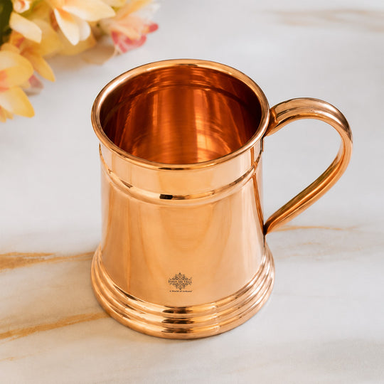 Traditional pure copper beer mug with curved copper handle