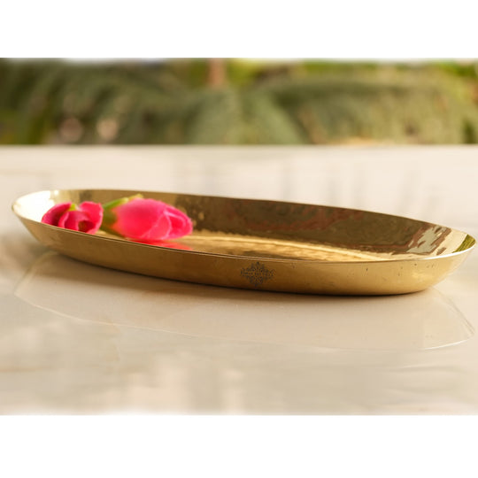 Premium brass platter by Indian Art Villa in oval shape with hammered design perfect for elegant Indian tableware