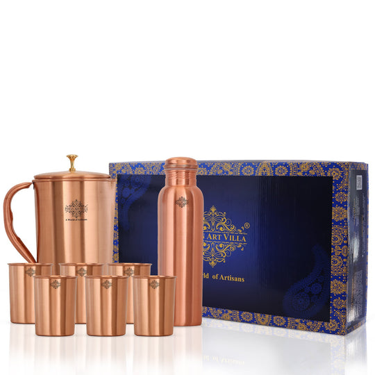 A beautiful copper jug, bottle, and glass set with a lacquered finish, perfect for any occasion.