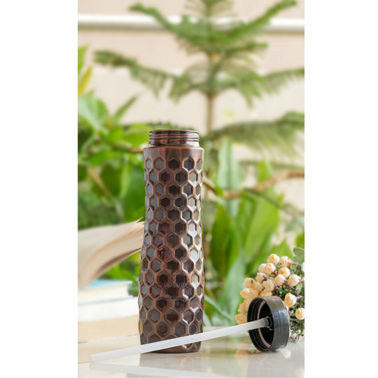 Indian Art Villa pure copper sipper bottle with elegant packaging, designed for Ayurvedic benefits and easy hydration.