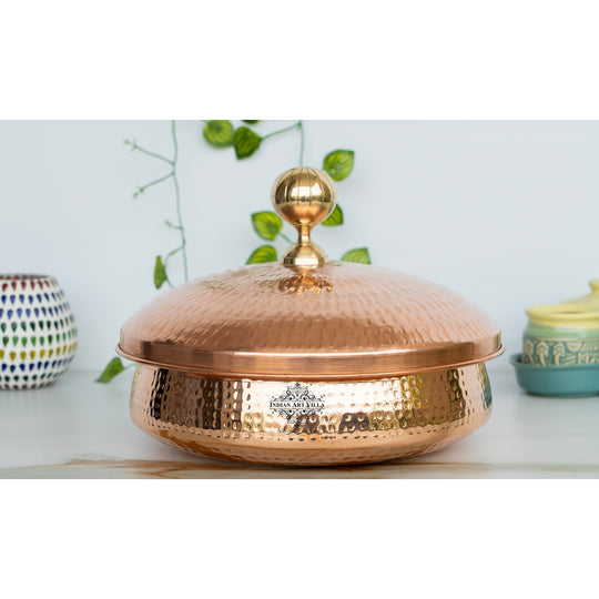 The soul of tradition lives in copper handi 1400ML Indian Art Villa hammered copper lid crowned with luminous brass knob