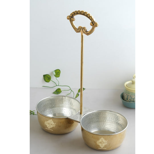 Handcrafted brass vegetable serving bowl with two compartments tin coated interiors and an ornate vertical brass handle