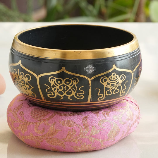 Black brass meditation singing bowl by golden artwork design, sound healing and yoga therapy bowl.